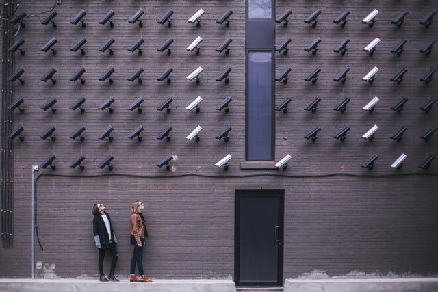 Hundreds of cameras looking down at a duo.